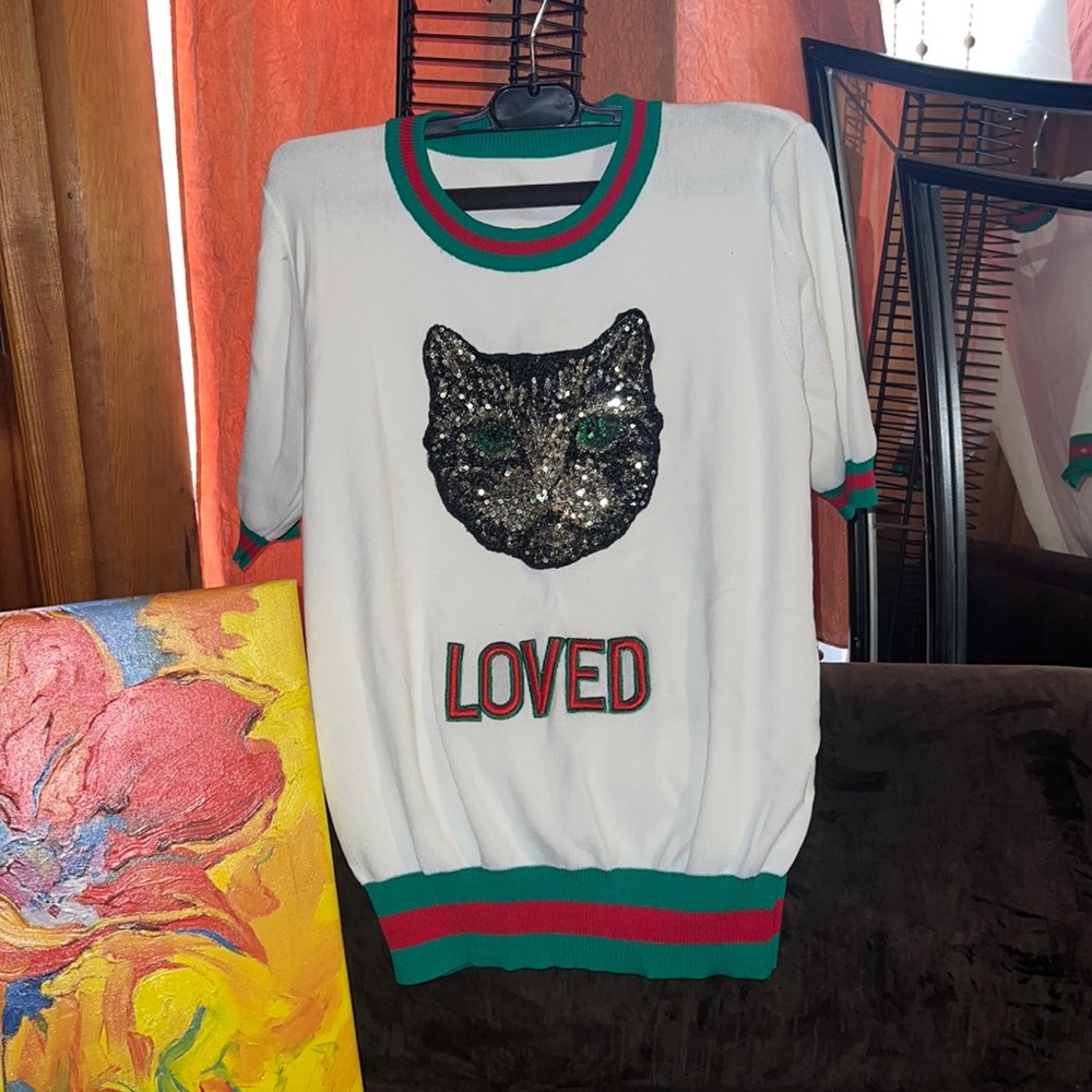 Red tan and green nit short sleeve with loved rhinestone cat. Sz.medium